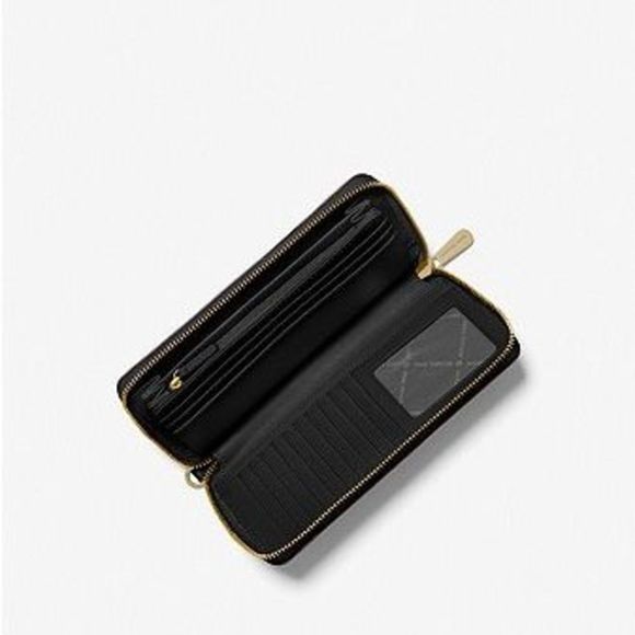 MICHAEL MICHAEL KORS nwt
Jet Set Travel Large Pebbled Leather Wristlet - Picture 2 of 8